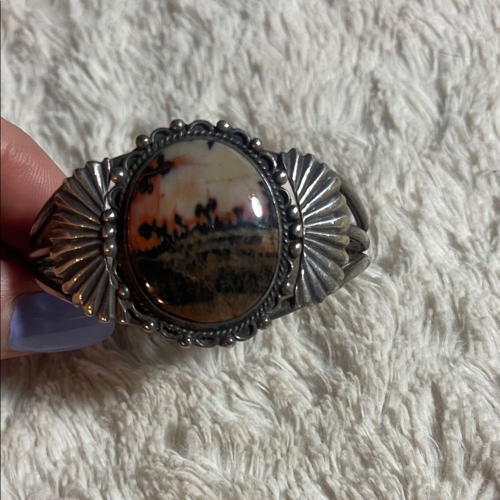 Vintage early 1900s Navajo sterling bracelet with petrified wood